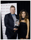 Shania Twain presents 2012/2013 Musicounts Teacher of The Year Award to Mark Reid